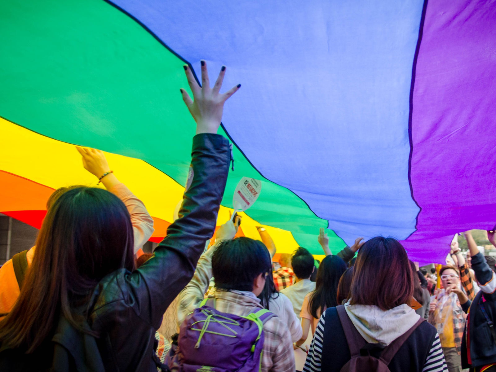 How does Hong Kong's hybrid culture affect its LGBTQ+ community?